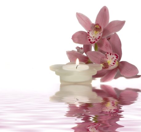 reflected orchid and candle